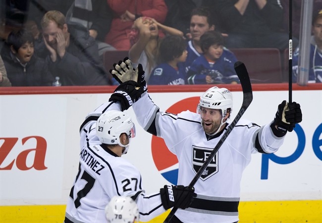Kings score two late goals to defeat Canucks - image