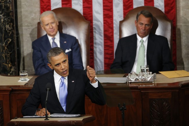 FILE - In this Jan. 28, 2014 file photo, Vice President Joe Biden and House Speaker John Boehner of Ohio listens as President Barack Obama gives his State of the Union address on Capitol Hill in Washington. 