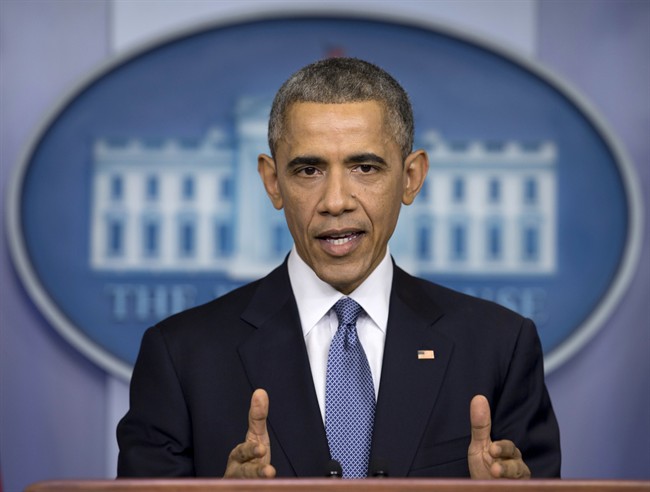 In this Dec. 19, 2014 file photo, U.S. President Barack Obama speaks during a news conference in the Brady Press Briefing Room of the White House.
