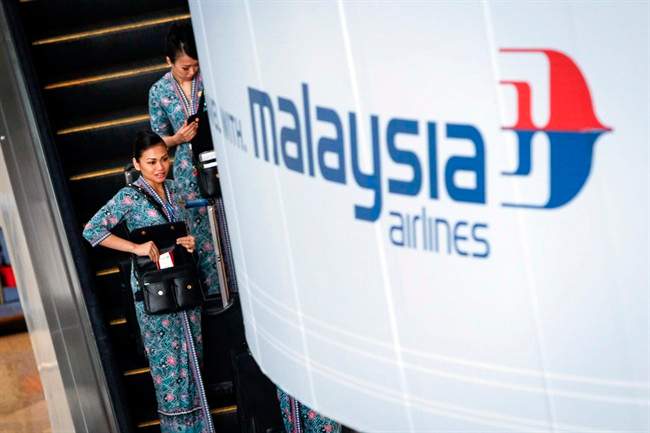 Families of 12 passengers on Flight 370 file lawsuits - image