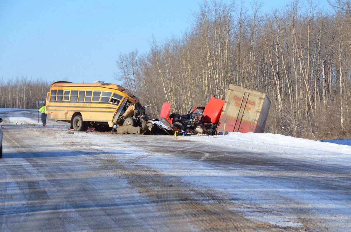 A school bus and semi truck collided near Grimshaw, Alberta, Feb. 2, 2015.