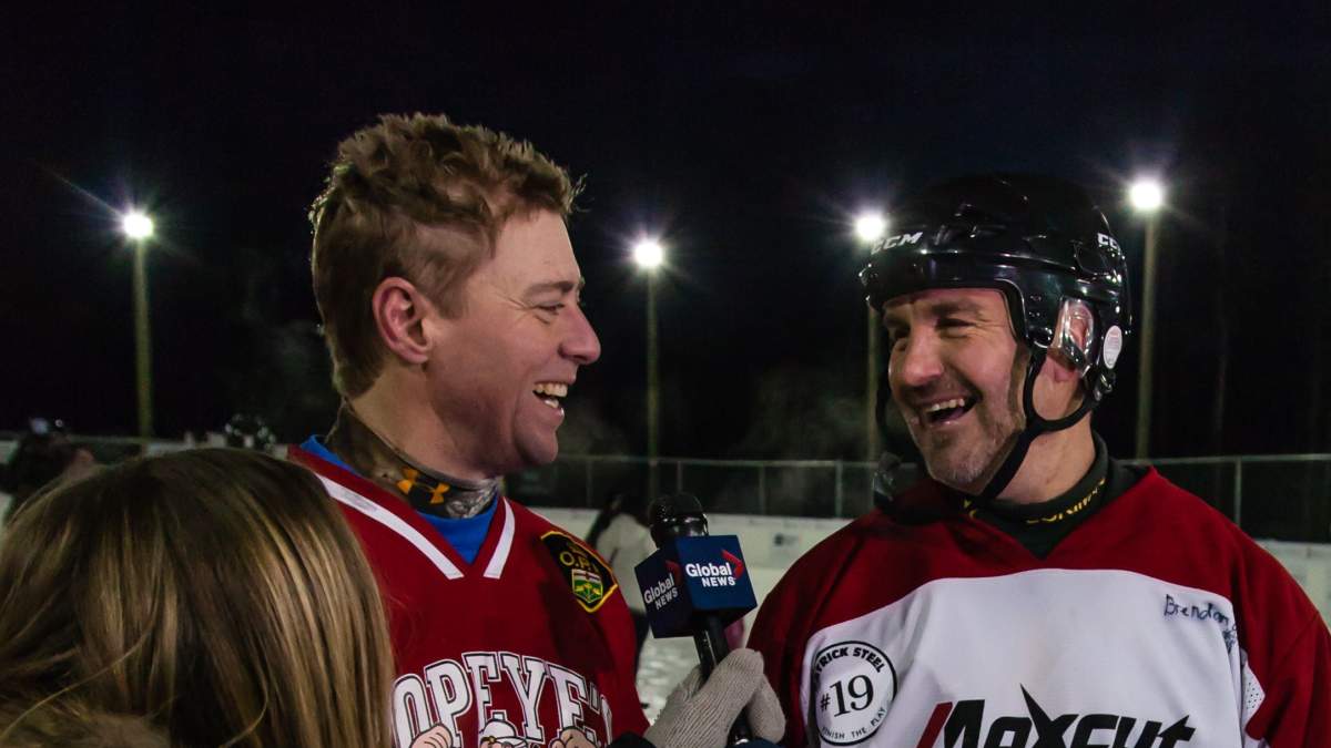Global reporter Jessica Kent interviews Brent Saik and Global’s Kevin Karius at the World’s Longest Hockey Game, Feb. 16, 2015.