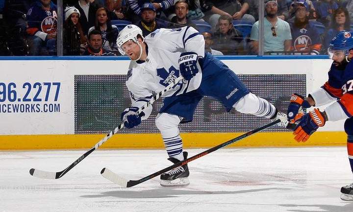 Phil Kessel #81 of the Toronto Maple Leafs skates against the New York Islanders at the Nassau Veterans Memorial Coliseum on February 12, 2015 in Uniondale, New York.