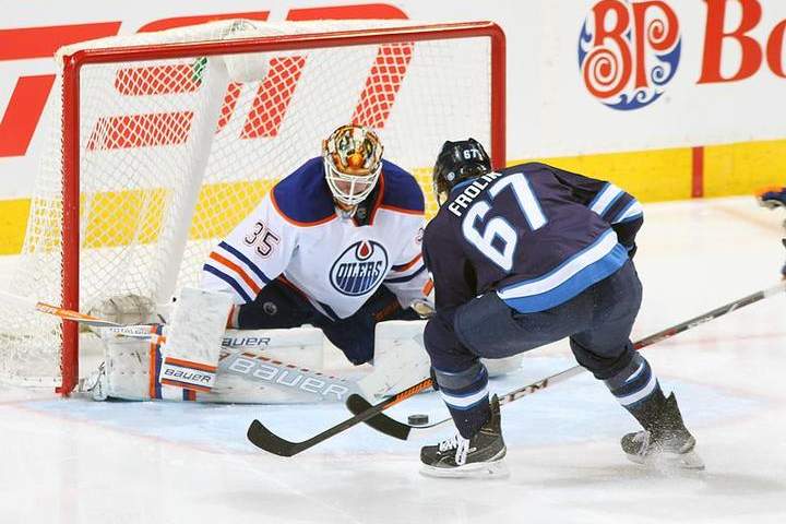 Wheeler, Scheifele help Jets edge Oilers