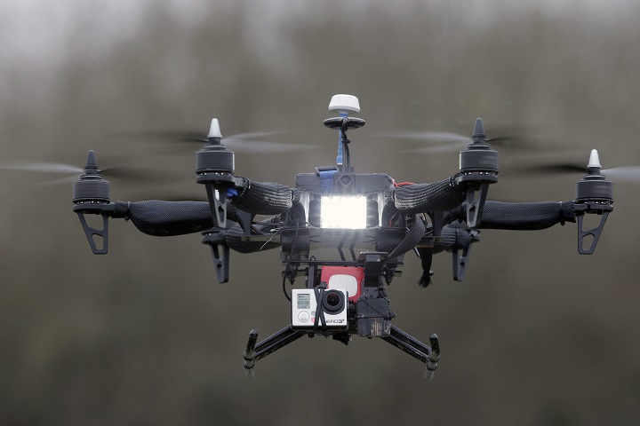 In this Feb. 9, 2015 file photo, French company Malou Tech's  "Army" speed drone mounted with a GoPro camera performs during a demonstration flight in La Queue-en-Brie, east of Paris, France. 