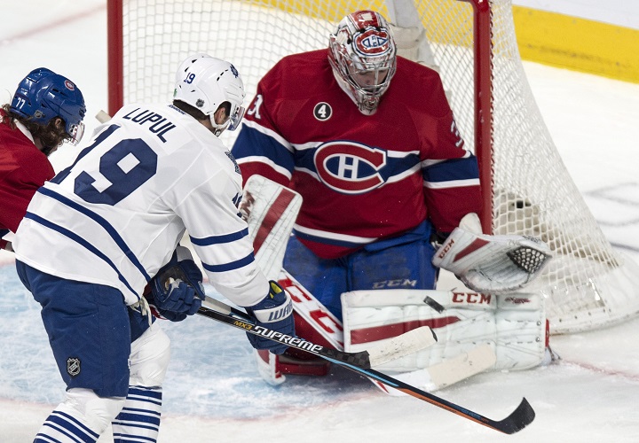 Montreal Canadiens goalie Carey Price makes a save off Toronto Maple Leafs' Joffrey Lupul during first period NHL hockey action Saturday, February 28, 2015 in Montreal. 