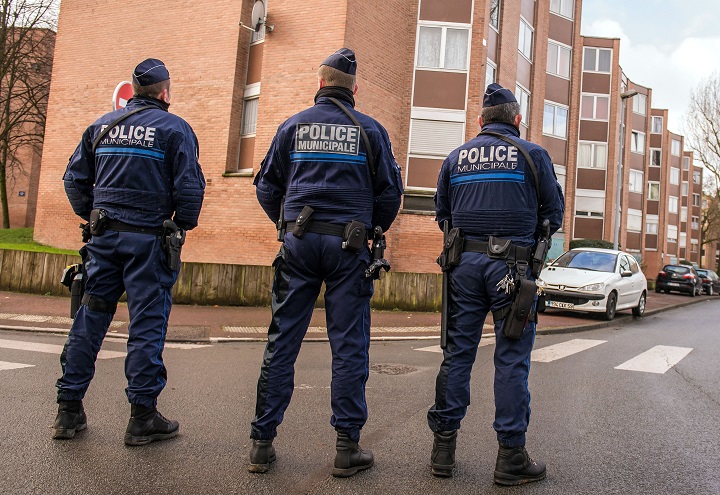French municipal police patrol a street in the northern city of Tourcoing on January 29, 2015, they work under the direct authority of a mayor. 