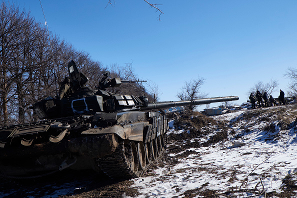 Pro-Russian rebels take position on the road to Debaltseve on February 18 2015 in Vuglegirsk .