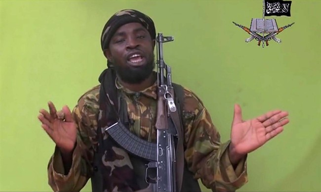 This May 12, 2014 file photo, taken from video by Nigeria's Boko Haram terrorist network, shows group leader Abubakar Shekau speaking to the camera. 