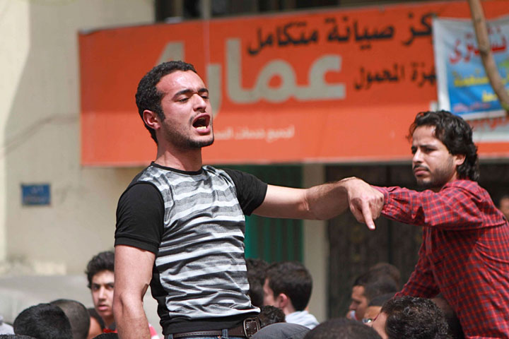In this April 1, 2011 photo, activist Ahmed Douma chants slogans during a march to Tahrir Square demanding the prosecution of members of former President Hosni Mubarak's government in Cairo, Egypt.