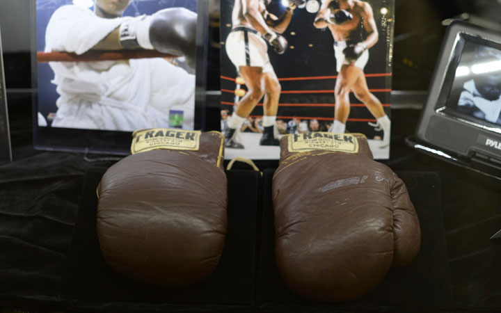1964 Cassius Clay (Muhammad Ali) Fight Worn Gloves from First Liston Bout on display during the media preview February 20, 2014 in New York of Heritage Auctions. A pair of gloves from 1965 are to be auctioned Feb. 21, 2015.