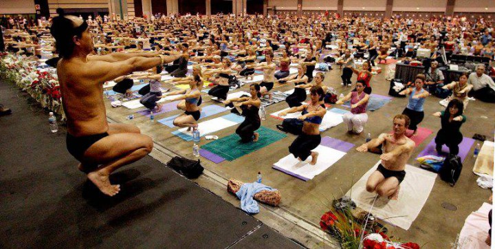 Bikram Choudhury, front, leads a yoga class at an expo at the Los Angeles Convention Center, Saturday, Sept. 27, 2003.
