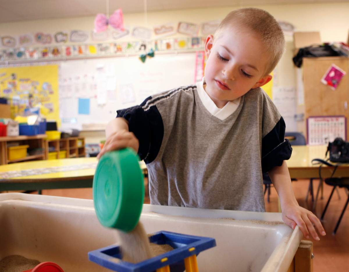 Cole Mercier, six, plays in his all-day kindergarten class in Calgary, Monday, June 15, 2009. 