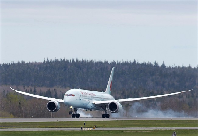 Air Canada forced to perform emergency landing because of backed up toilets.