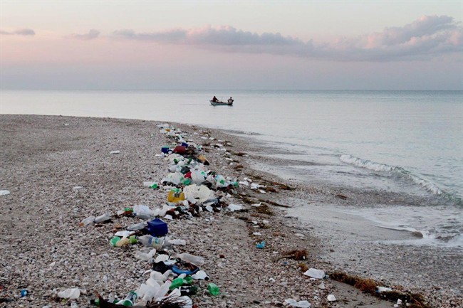 Marine debris and plastic pollution are shown along the coastline of Haiti in a handout photo.