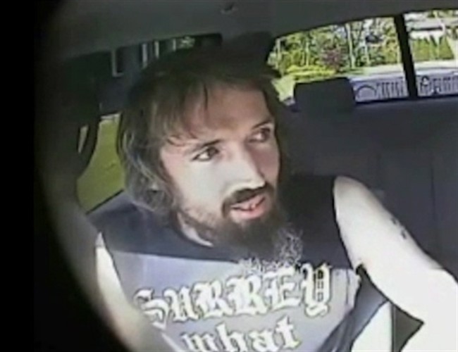 John Nuttall is shown in a still image taken from RCMP undercover video. The trial for a husband and wife accused of plotting to bomb the B.C. legislature on Canada Day heard they were worried their plan would be hampered if they ran out of methadone. THE CANADIAN PRESS/HO-RCMP.