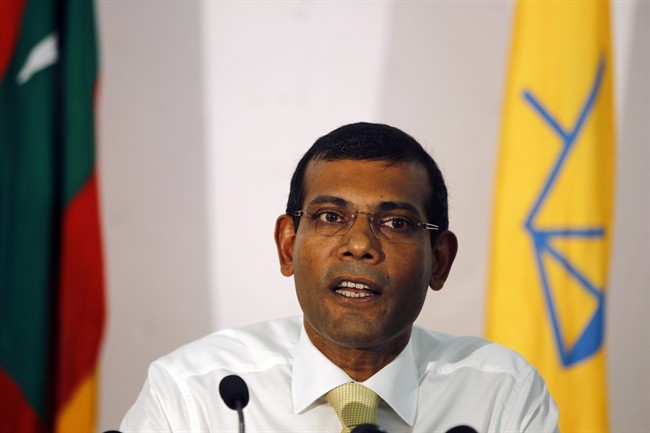 In this Nov. 10, 2013 file photo, former Maldives President and the then presidential candidate, Mohamed Nasheed, speaks to the media in Male, Maldives.