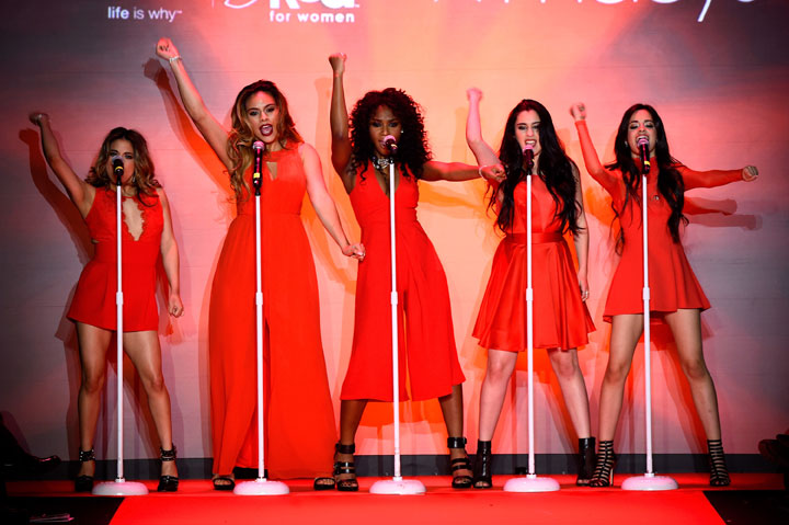 Fifth Harmony performs on the runway at the Go Red For Women Red Dress Collection 2015 presented by Macy's fashion show during Mercedes-Benz Fashion Week Fall 2015 at The Theatre at Lincoln Center on February 12, 2015 in New York City.