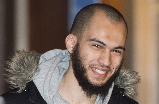 Merouane Ghalmi smiles as he arrives at the Montreal Courthouse in Montreal, Thursday, February 26, 2015.