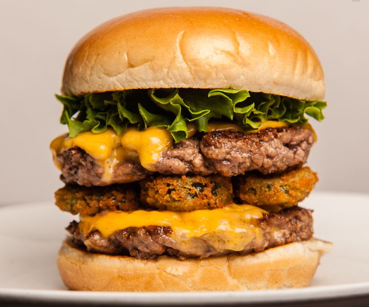 The "Holy Smokes" is a double cheeseburger topped with panko-crusted, deep fried jalapenos. 