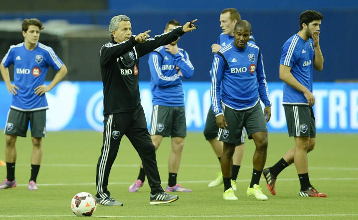 Montreal Impact head coach Frank Klopas gives direction to players.