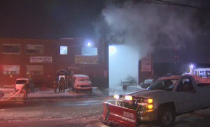 Fire crews attend to a garage fire in Scarborough on Feb. 23, 2015.