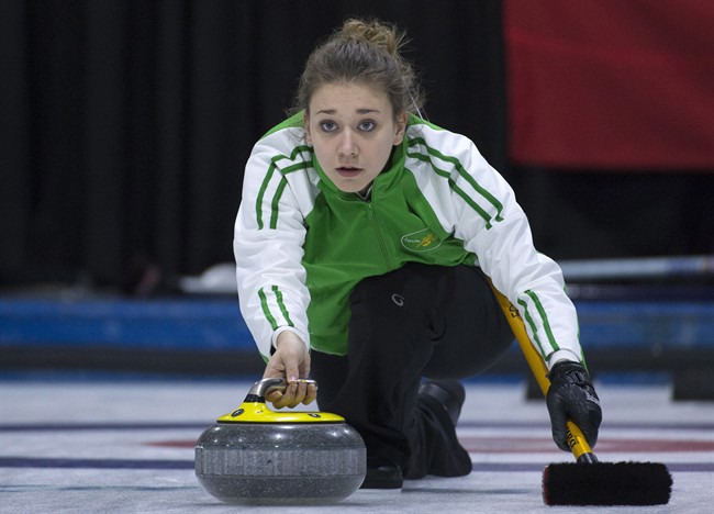 Saskatchewan third Sara England makes a shot during a draw against British Columbia at the Canada Winter Games in Prince George, B.C. Thursday, Feb. 26, 2015. 