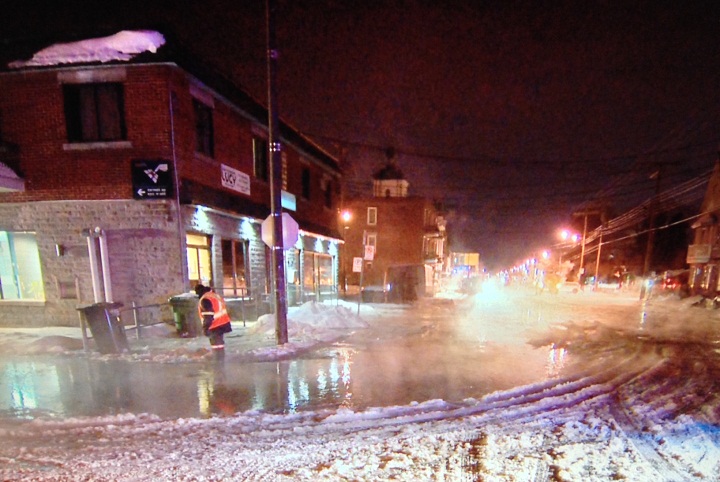 A broken water main in Lachine led to heavy flooding and headaches for city workers and residents on February 17, 2015.