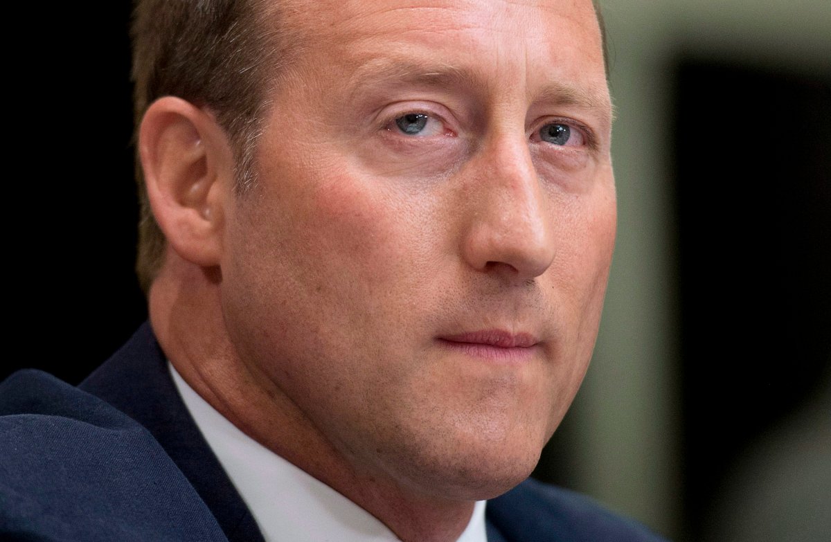 Justice Minister Peter MacKay waits to appear before the Senate standing committee on Legal and Constitutional Affairs in Ottawa Tuesday September 9, 2014. THE CANADIAN PRESS/Adrian Wyld.