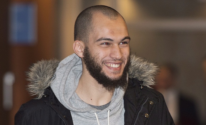 Merouane Ghalmi smiles as he arrives at the Montreal Courthouse in Montreal, Thursday, February 26, 2015.