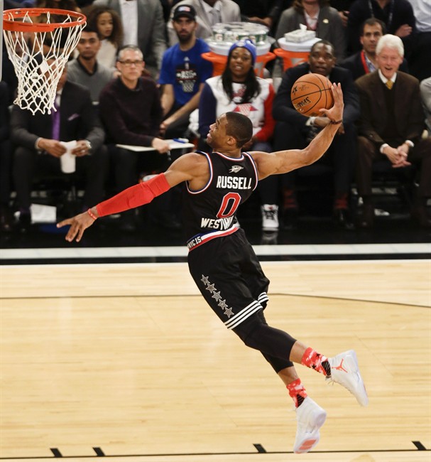 West Team's Russell Westbrook, of the Oklahoma City Thunder, dunks the ball during the first half of the NBA All-Star basketball game, Sunday, Feb. 15, 2015, in New York.
