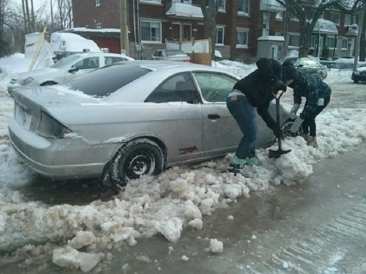 NDG residents were chipping their cars out of the ice after a water main break on February 20, 2015.