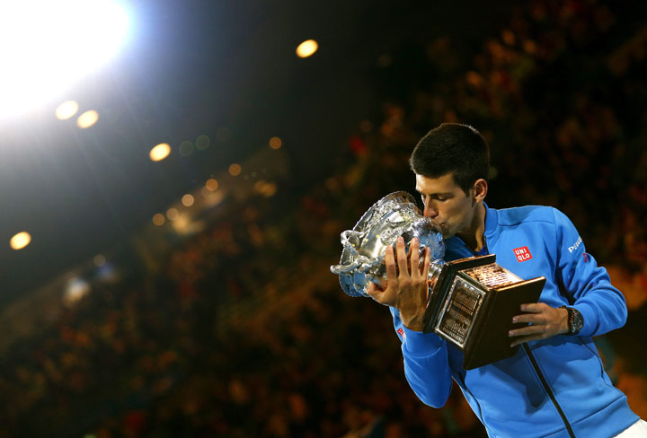 Novak Djokovic of Serbia celebrates after winning his fifth Australian Open title in Melbourne on Feb. 1, 2015.