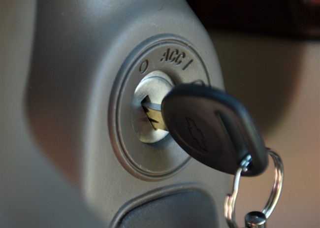 This Tuesday, April 1, 2014, file photo, shows a key in the ignition switch of a 2005 Chevrolet Cobalt in Alexandria, Va. 