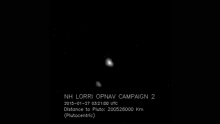 Pluto and Charon, the largest of Pluto's five known moons, seen Jan. 25, 2015, through the telescopic Long-Range Reconnaissance Imager (LORRI) on NASA's New Horizons spacecraft.
