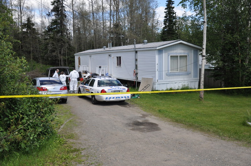 Police on the property where Jordan was found in 2012.