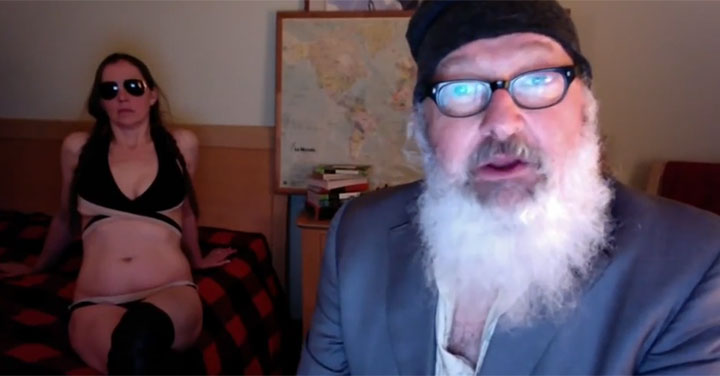 Randy Quaid appears in a video posted online. Wife Evi is seen in the background.