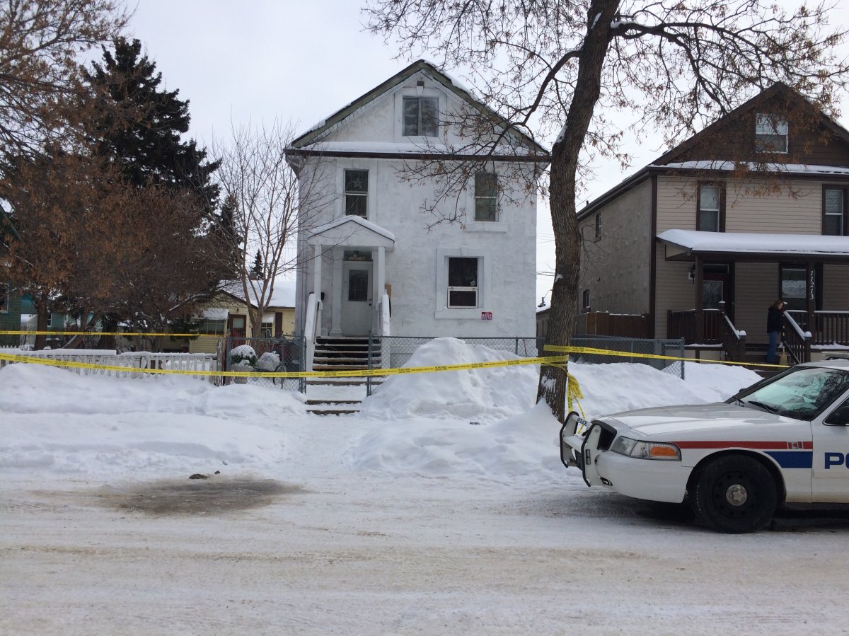 A home on 112 Avenue and 95 A Street in the Alberta Avenue area, where a woman was found dead on Monday night. Tuesday, January 10, 2015.