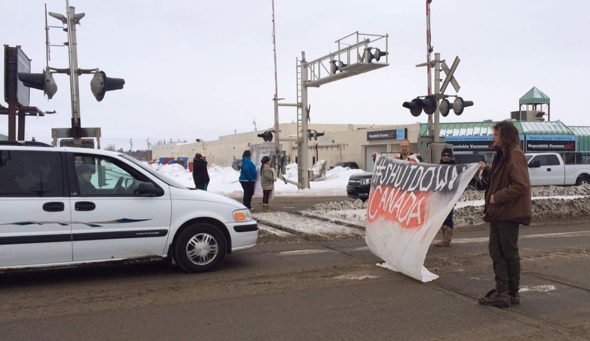 Protesters from Shut Down Canada blocked Albert Street Friday afternoon.
