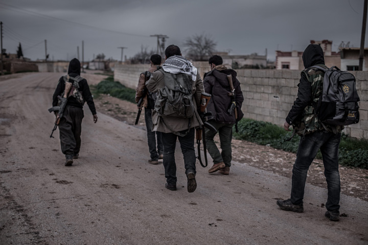 Kurdish rebels fight against ISIS near Kobani, Syria, on February 18, 2015. 