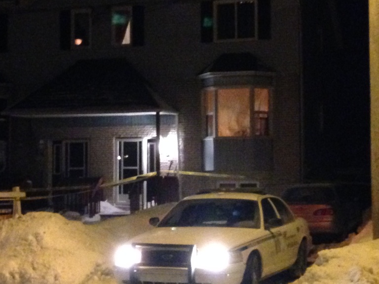 Yellow tape surrounds 16 Tiger Maple Drive in Timberlea.