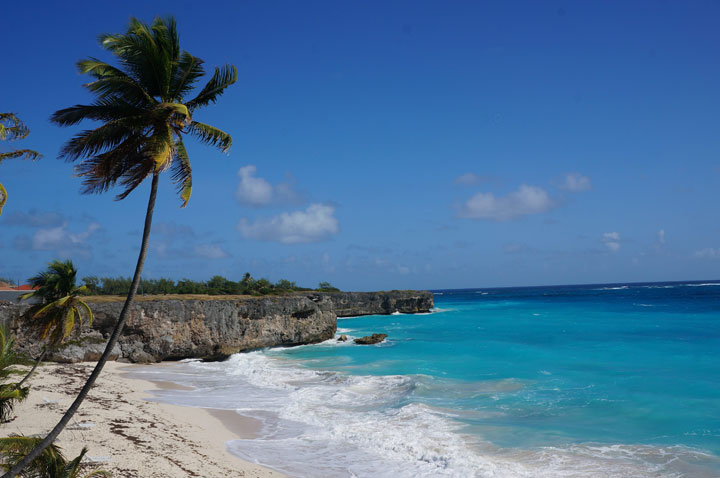 This January 2015 photo shows Bottom Bay in Barbados. The Caribbean island is relatively easy on the wallet, with easy-to-use public vans to beaches around the island, plus dining options like Oistins Fish Fry, an outdoor bazaar of restaurant shacks serving heaping plates of food.