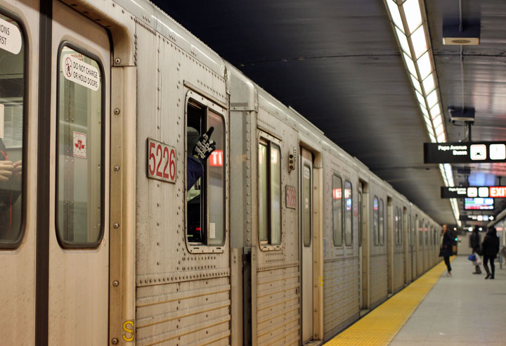 TTC subway guards pointing at the wall. Why? Some don’t know - image