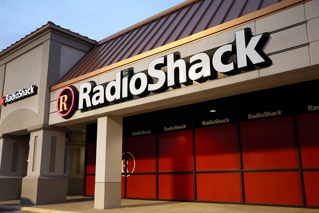 This Tuesday, Feb. 3, 2015 photo shows a RadioShack store in Dallas. The company that introduced the first mass-market personal computer, is fading after years of heavy losses and the suspension of its shares. 
