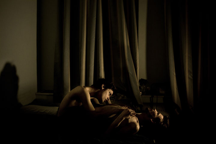 World Press Photo of the Year 2014. Jonathan Jacques Louis, 21, and Alexander Semyonov, 25, a gay couple during an intimate moment in St. Petersburg, Russia. 