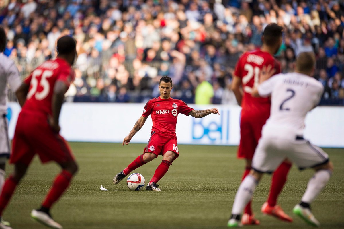 Toronto FC midfielder Sebastian Giovinco takes a penalty kick against the Vancouver Whitecaps during the second half.