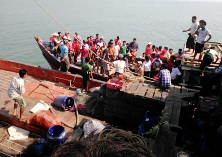 This image provided by DVB shows survivors who were saved after their ferry capsized near Kyauk Phyu port. The death toll has now climbed to 59.