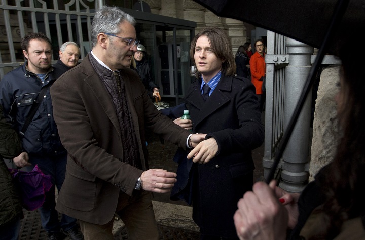 Amanda Knox's Italian ex-boyfriend Raffaele Sollecito, right, arrives at Italy's highest court building, in Rome, Wednesday, March 25, 2015. American Amanda Knox and her Italian ex-boyfriend expect to learn their fate Wednesday when Italy's highest court hears their appeal of their guilty verdicts in the brutal 2007 murder of Knox's British roommate. Several outcomes are possible, including confirmation of the verdicts, a new appeals round, or even a ruling that amounts to an acquittal in the sensational case that has captivated audiences on both sides of the Atlantic. 