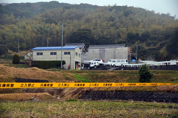 No Entry tape surrounds a site where a man stabbed five people to death at Sumoto city in Awajishima island, Hyogo prefecture, western Japan on March 9, 2015.