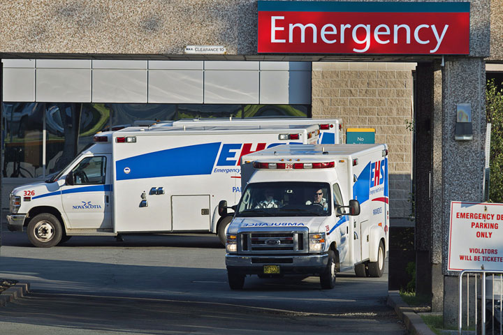 Paramedics are seen at the Dartmouth, N.S. General Hospital in on July 4, 2013.